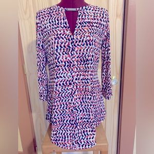 Multi colored, longer in front and back. Great with leggings